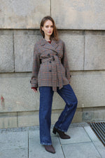 КАРИРАНО ПАЛТО ОТ СУРОВА ВЪЛНА